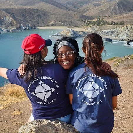Three girls enjoying the view and their Girls in Science fellowship on Catalina Island