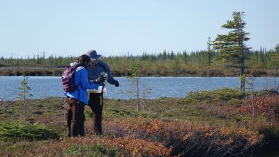 Two Earthwatch volunteers doing fieldwork