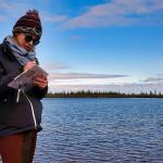 An Earthwatch volunteer recording data in Churchill, Manitoba